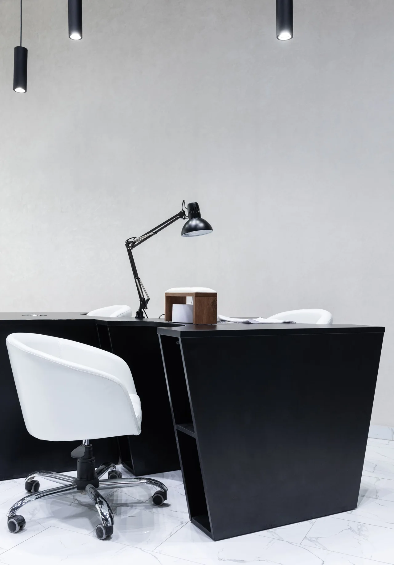 A work surface with a chair and adjustable task lamp