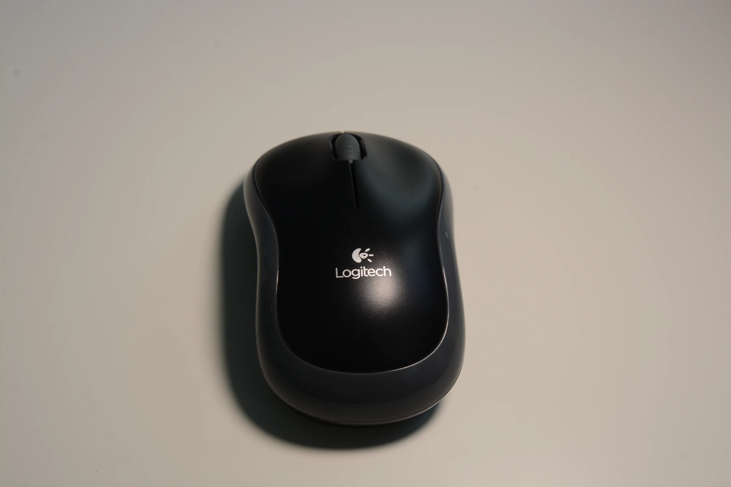 Logitech M185 mouse HS01 — black with grey trim