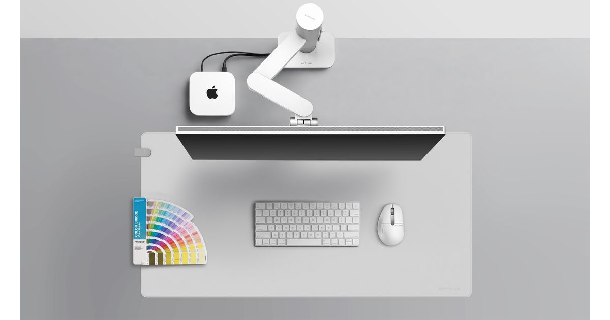 Silver BenQ iScreenBar mounted above an iMac, viewed from above