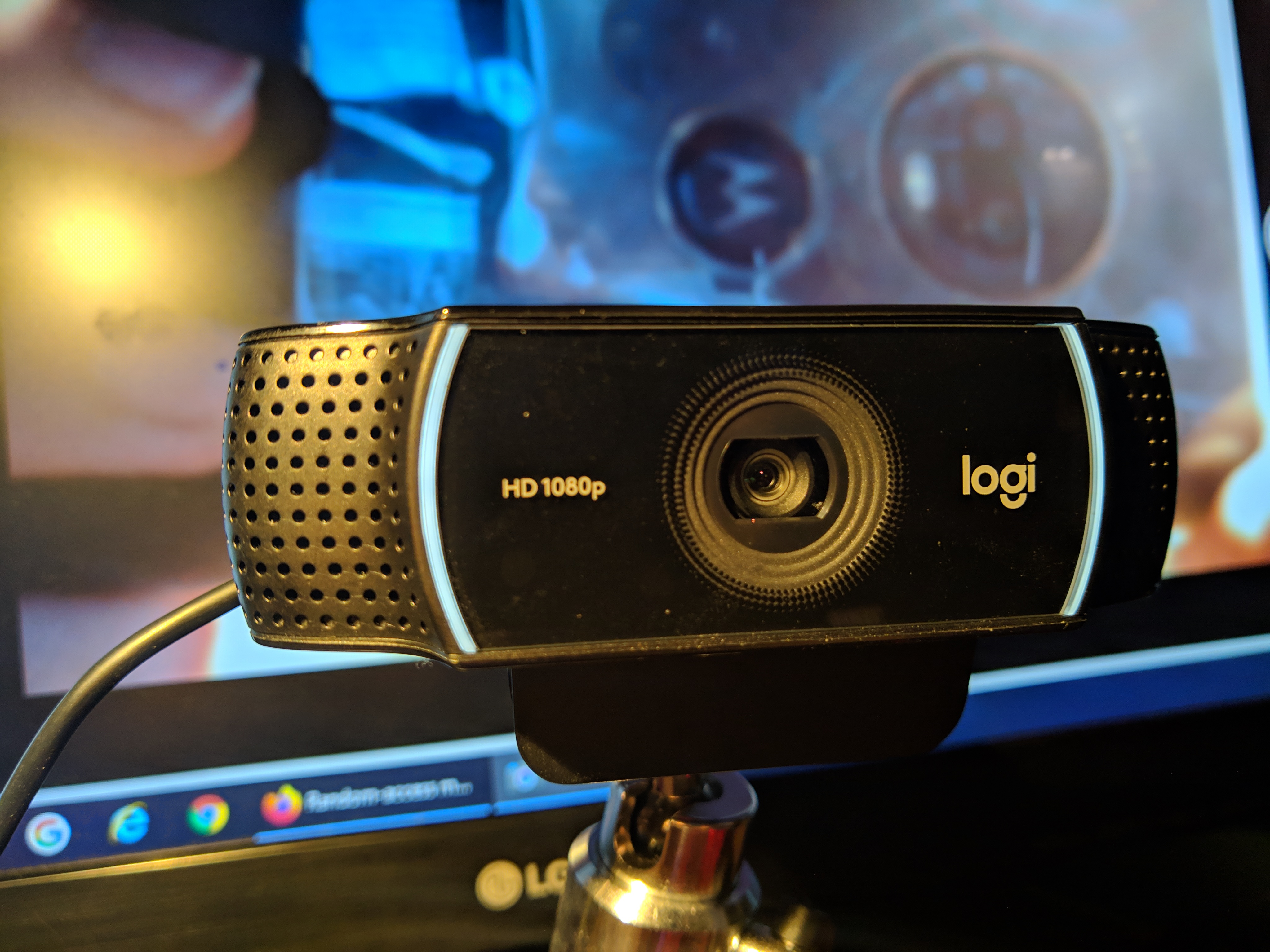 Authentic black Logitech C922 webcam front and integrated mounting clip